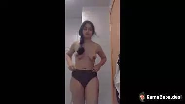 An Indian nude girl strips and shoots MMS