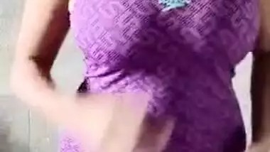 Desi slut takes off swimsuit to show her XXX tits in the mirror