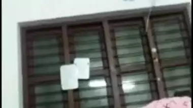 Sexy Desi mom exposes boobies to jerking off man on the other side