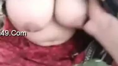 Babe with roots in India flaunts her XXX boobs and cameraman touches them